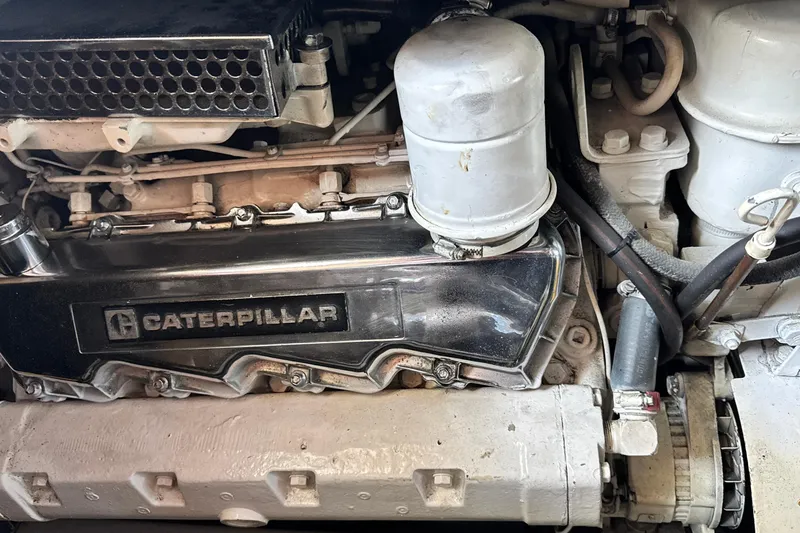 Slide: The Image of Caterpillar engine in a 1990 Mediterranean 38 Sport Fisher boat. - 42