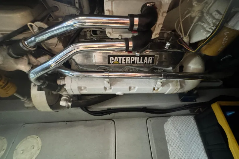 Slide: The Image of Engine compartment of a 1990 Mediterranean 38 Sport Fisher with Caterpillar components. - 59
