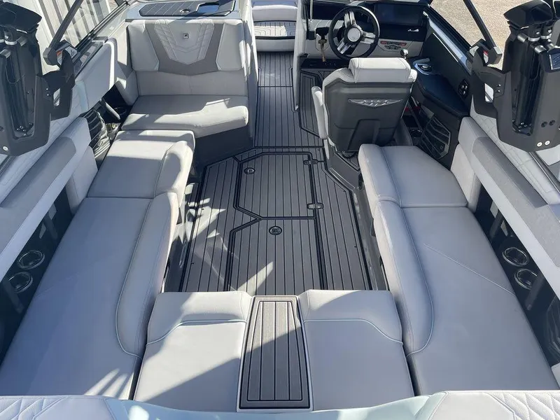 Slide: The Image of 2024 Nautique Super Air Nautique G23 interior, featuring spacious seating and modern design. - 5