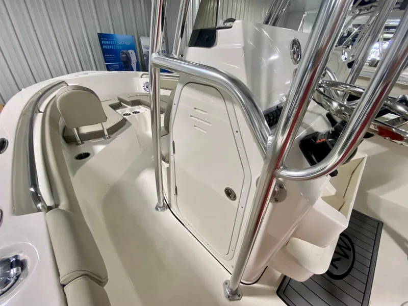 Slide: The Image of 2024 Key West 203 FS boat interior with seating and console. - 12