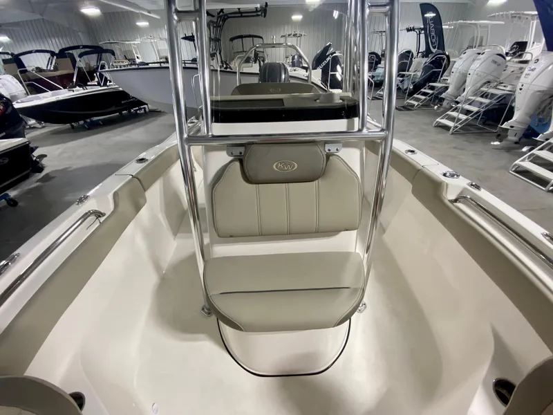 Slide: The Image of 2024 Key West 203 FS boat interior with seating and stainless steel frame. - 14