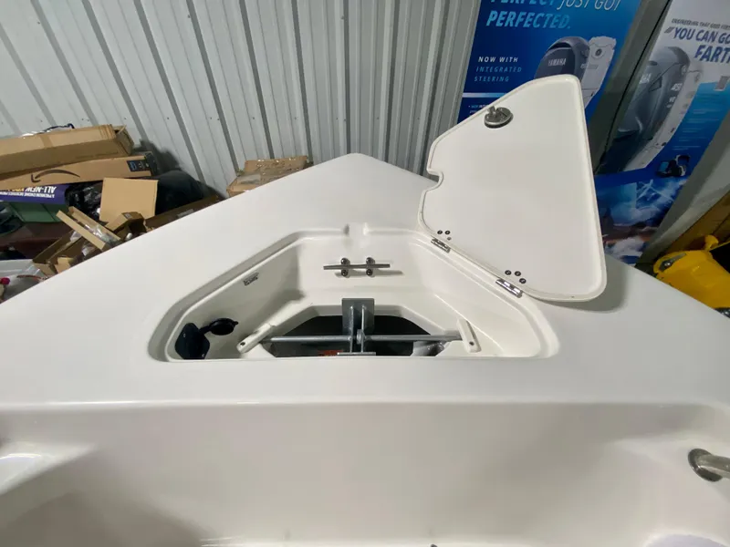 Slide: The Image of 2024 Key West 203 FS boat anchor storage compartment with open hatch. - 20