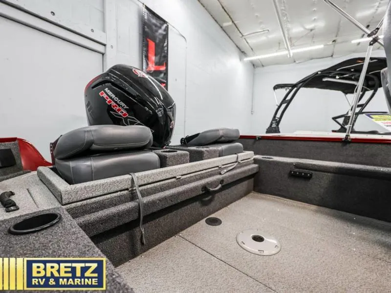 Slide: The Image of 2024 Fishing Machine 1775 WT boat interior with motor, showcased at Bretz RV & Marine. - 16