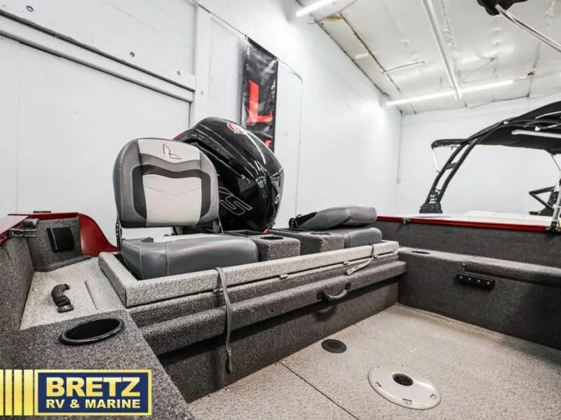 Slide: The Image of 2024 Fishing Machine 1775 WT interior with seating and motor, displayed at Bretz RV & Marine. - 17