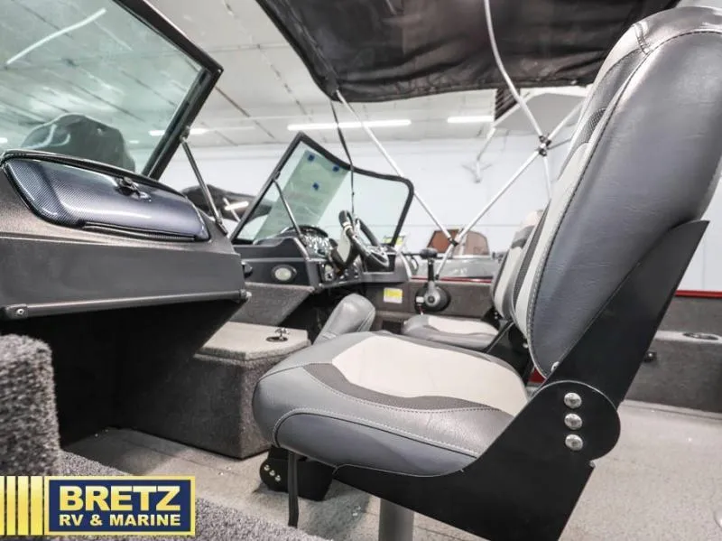 Slide: The Image of 2024 Fishing Machine 1775 WT interior with seating and dashboard, showcased at Bretz RV & Marine. - 18
