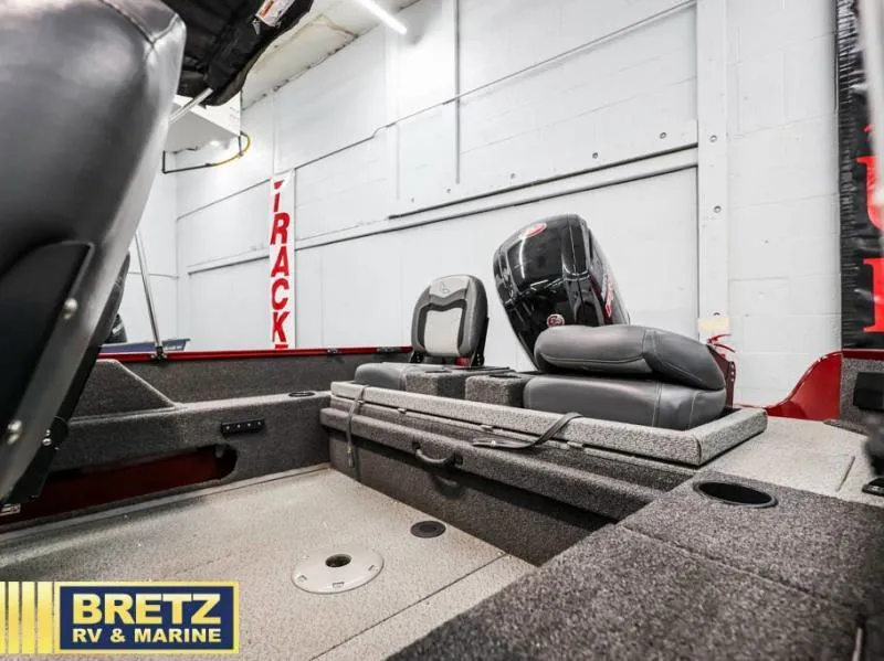 Slide: The Image of 2024 Fishing Machine 1775 WT interior with seating and motor, displayed at Bretz RV & Marine. - 19