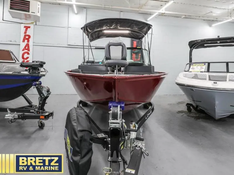 Slide: The Image of 2024 Fishing Machine 1775 WT boat displayed at Bretz RV & Marine showroom. - 4