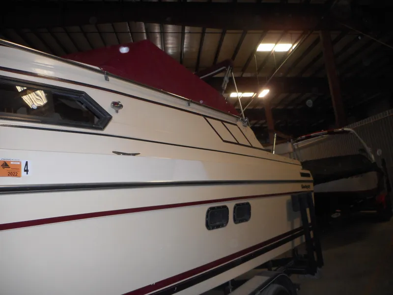 Slide: The Image of 1984 Beachcraft Cabin Cruiser in indoor storage. - 6