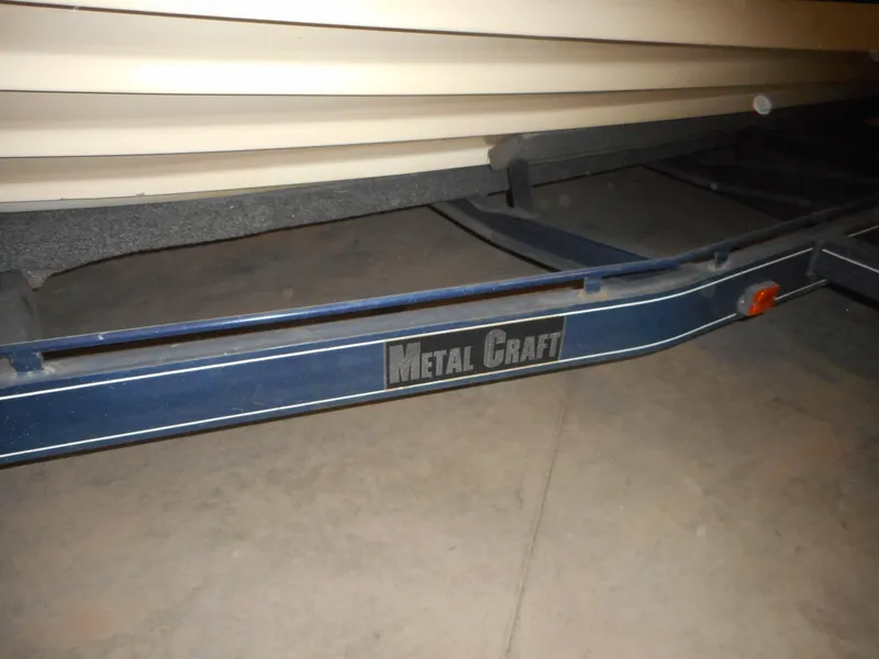 Slide: The Image of 1984 Beachcraft Cabin Cruiser on Metal Craft trailer. - 7