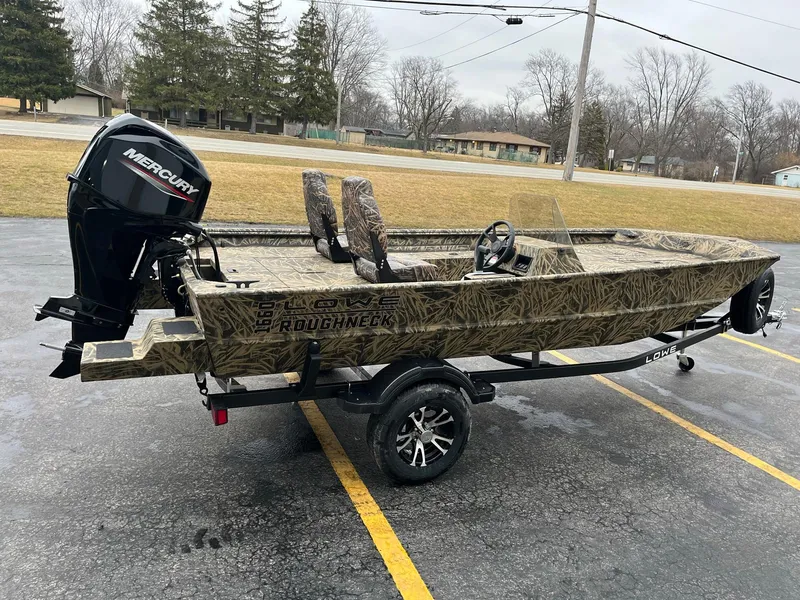 Slide: The Image of 2024 Lowe Roughneck RX1660 SC boat with a 60 HP outboard motor, rear view. - 3