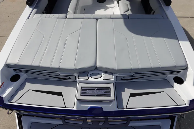 Slide: The Image of 2024 Malibu 21 LX-R boat rear seating and sun deck. - 12