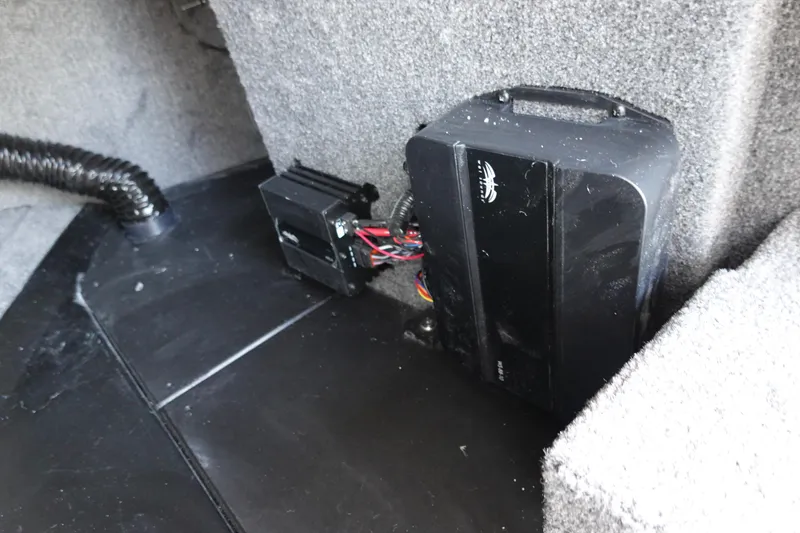 Slide: The Image of Battery compartment of 2024 Malibu 21 LX-R boat. - 31