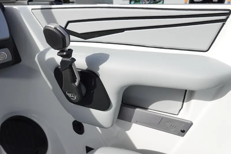Slide: The Image of 2024 Malibu 21 LX-R boat ignition and control panel close-up. - 37