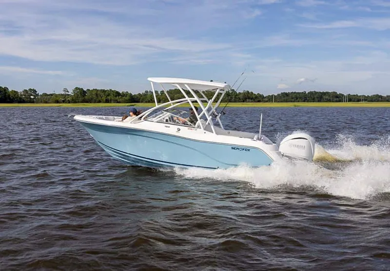 Slide: The Image of 2025 Sea Fox 228 Traveler boat cruising on open water. - 2