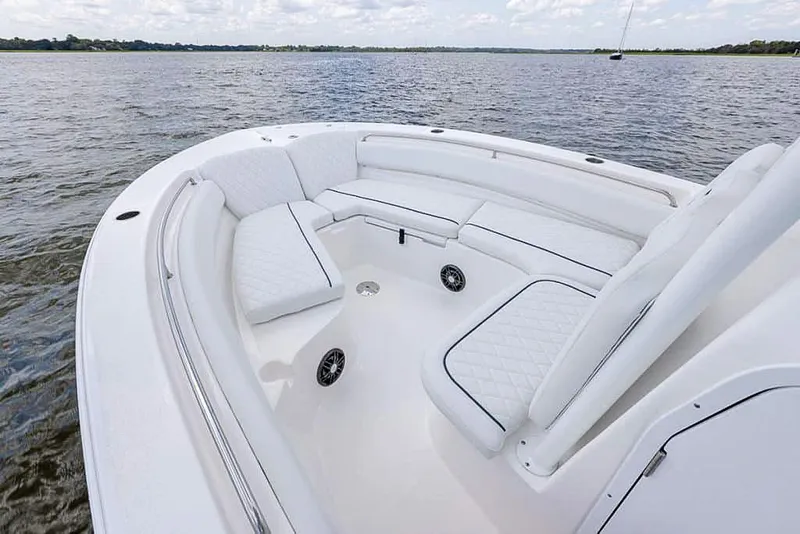 Slide: The Image of 2025 Sea Fox 248 Side Console boat with spacious seating on calm waters. - 13