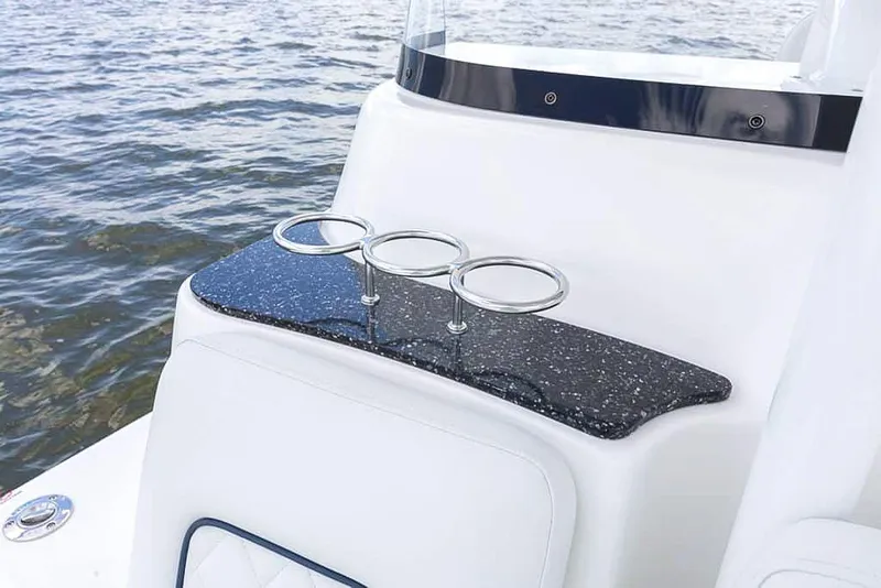 Slide: The Image of 2025 Sea Fox 248 Side Console boat with cup holders and ocean view. - 15
