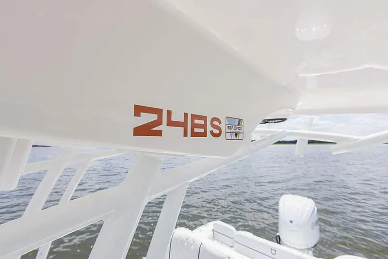 Slide: The Image of 2025 Sea Fox 248 Side Console boat on water, close-up of model number. - 16