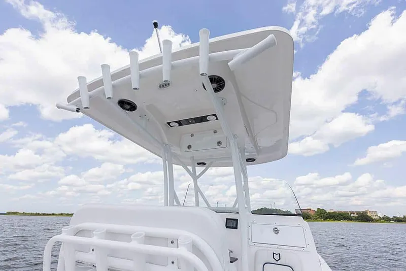 Slide: The Image of 2025 Sea Fox 248 Side Console boat with T-top on a sunny day. - 18