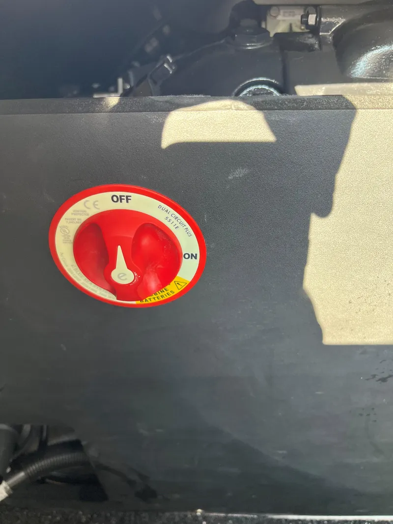 Slide: The Image of 2024 Regal LS2 engine compartment with red battery switch. - 13