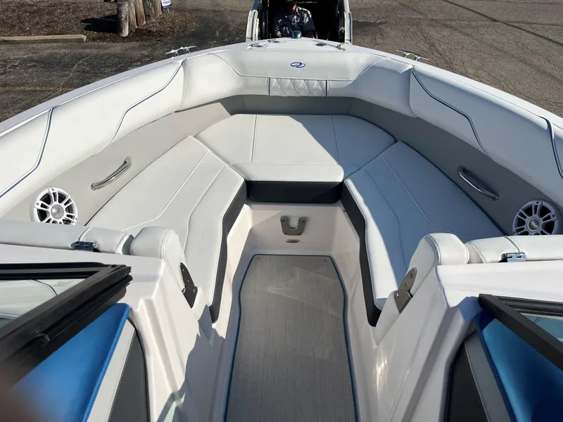 Slide: The Image of 2024 Regal LS2 boat interior with white seating and modern design. - 4