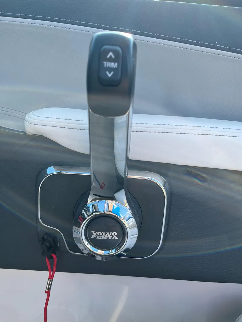 Slide: The Image of 2024 Regal LS2 boat throttle control with Volvo Penta branding. - 9