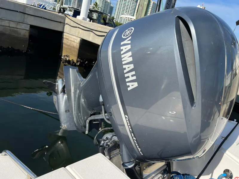 Slide: The Image of Garmin radar on 2018 Robalo 246 Cayman boat docked at marina. - 17