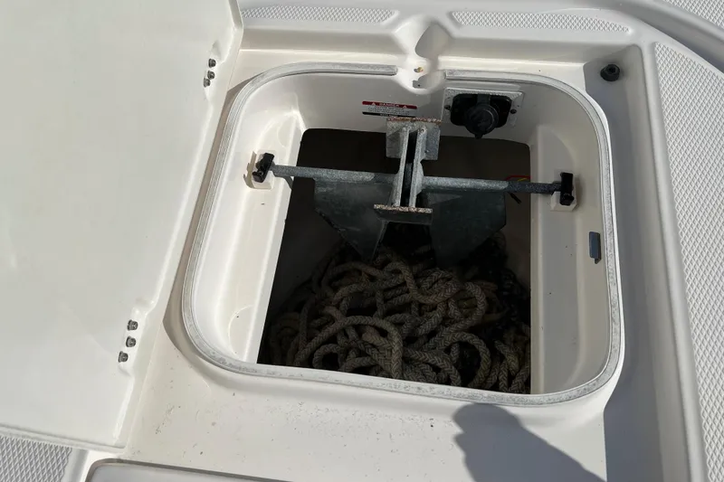 Slide: The Image of 2018 Robalo 246 Cayman with Yamaha outboard engine at marina. - 19