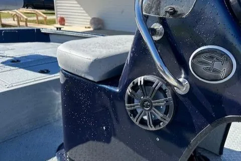 Slide: The Image of 2024 SeaArk RXT 180 boat interior with seat and speaker system. - 7