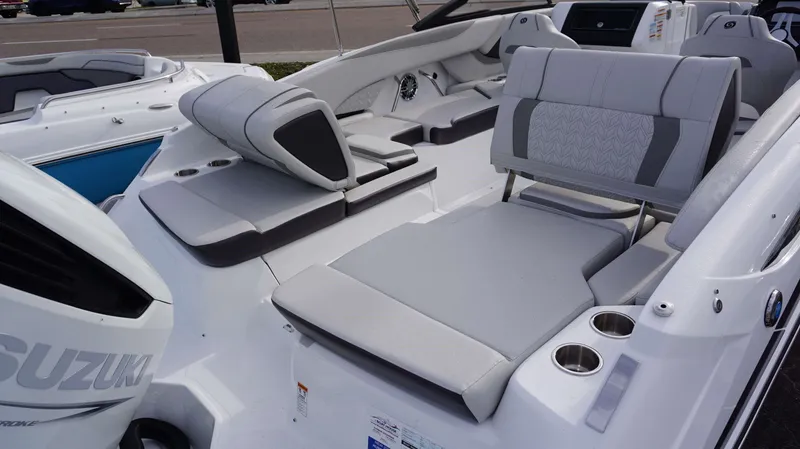 Slide: The Image of 2024 Hurricane 2600 SD boat interior with Suzuki engine, featuring comfortable seating and cup holders. - 6