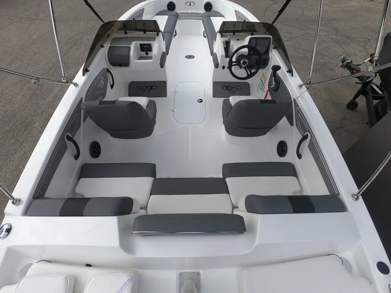 Slide: The Image of 2024 Tahoe T21 boat interior with gray and white seating. - 11