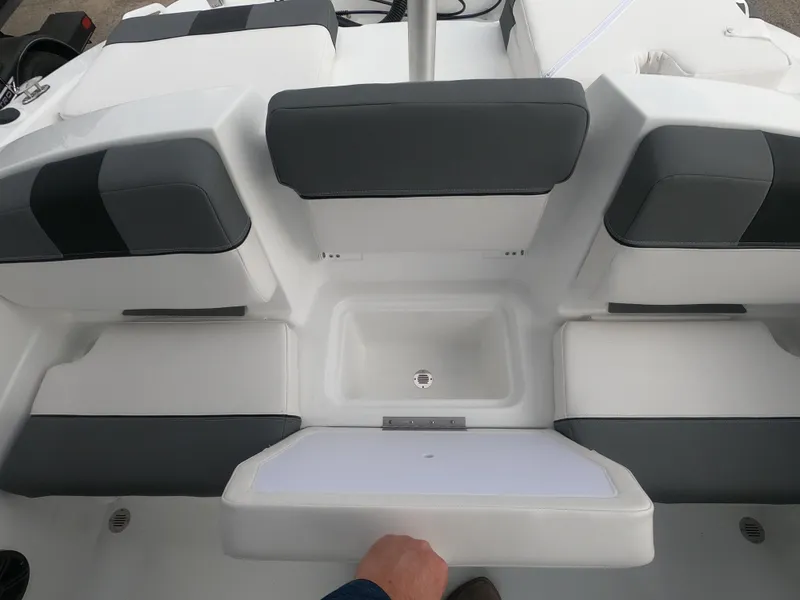 Slide: The Image of 2024 Tahoe T21 boat interior seating and storage compartment. - 16
