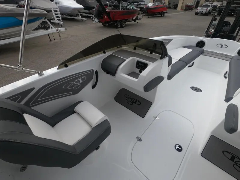 Slide: The Image of 2024 Tahoe T21 boat interior with seating and dashboard. - 17