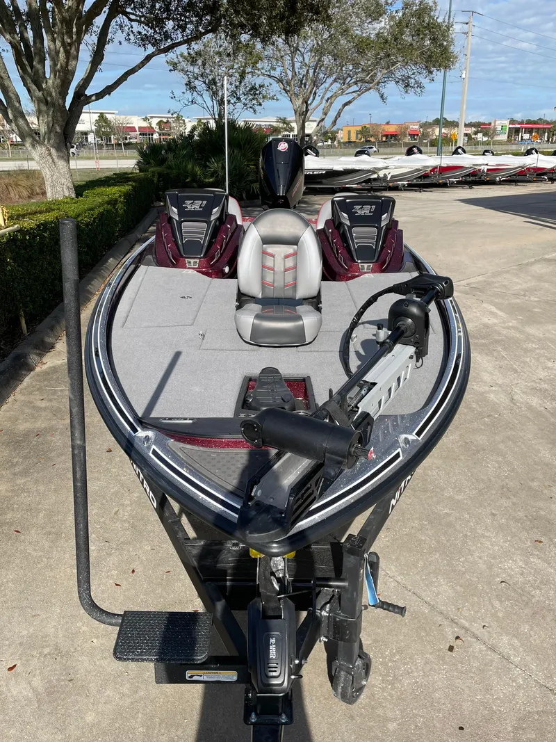Slide: The Image of 2024 Nitro Z21 XL fishing boat with advanced equipment and seating. - 5