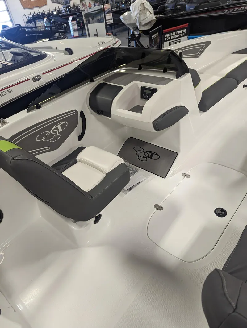 Slide: The Image of 2024 Tahoe T21 boat interior with sleek seating and modern design. - 5