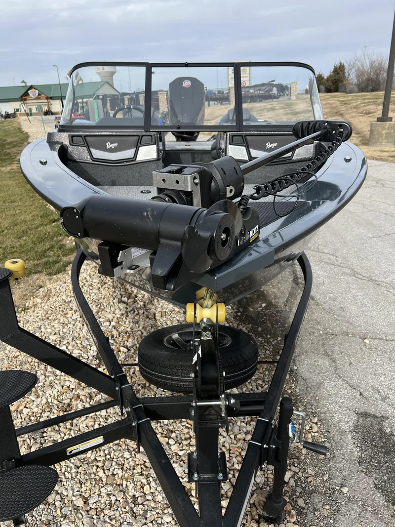 Slide: The Image of 2024 Ranger VX1788 WT fishing boat on a trailer, front view. - 2