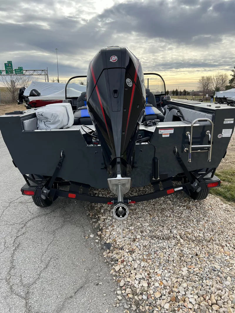 Slide: The Image of 2024 Ranger VX1788 WT boat rear view with outboard motor. - 6