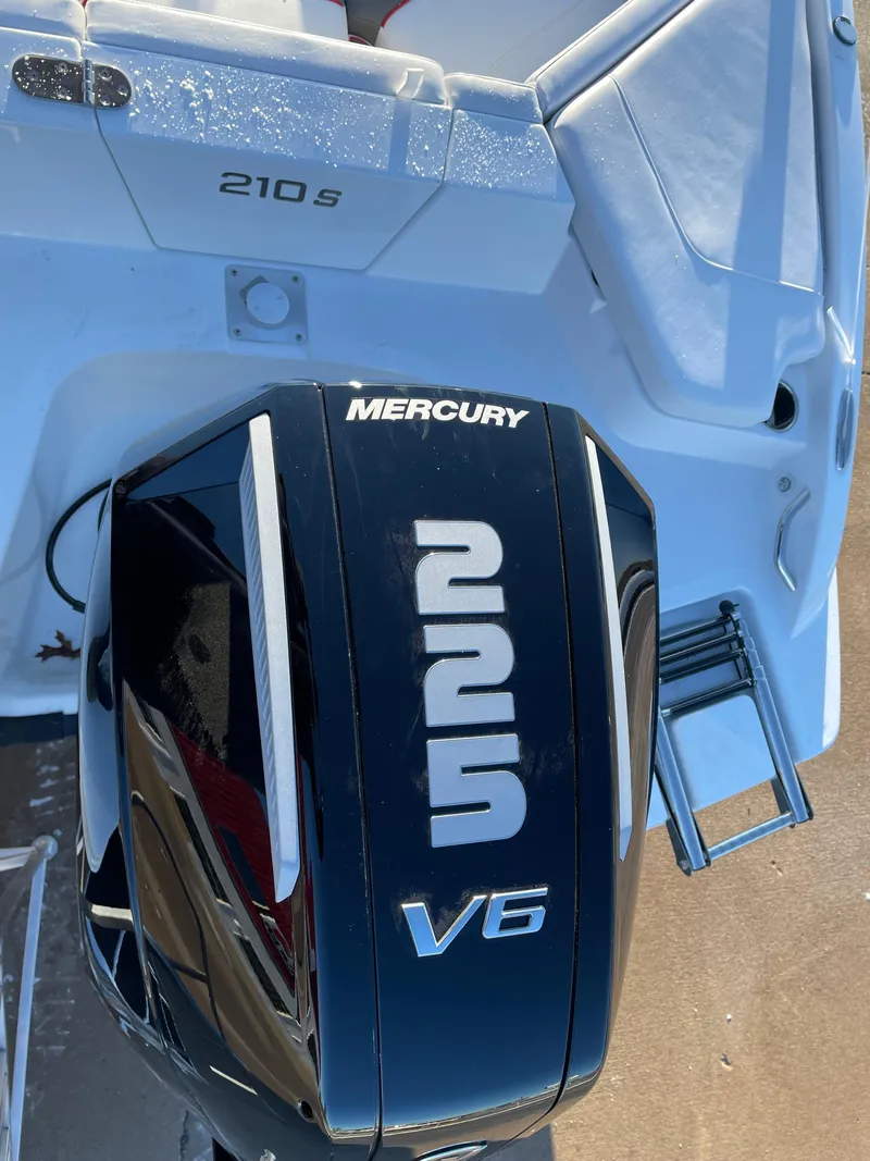 Slide: The Image of 2024 Tahoe 210 S boat with Mercury 225 V6 engine, top view. - 5