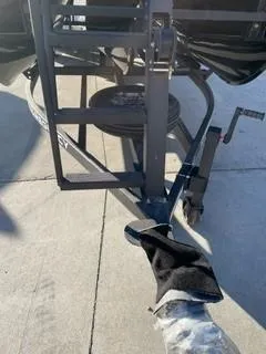 Slide: The Image of 2024 Regency 230 LE3 Sport boat trailer hitch and winch system. - 6