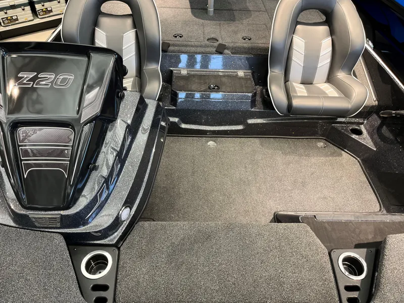 Slide: The Image of 2024 Nitro Z20 Pro boat interior with dual seats and storage compartments. - 2