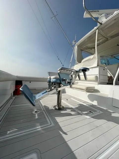 Slide: The Image of 1991 Tiara Yachts 4300 Open deck with fishing chair and equipment. - 12