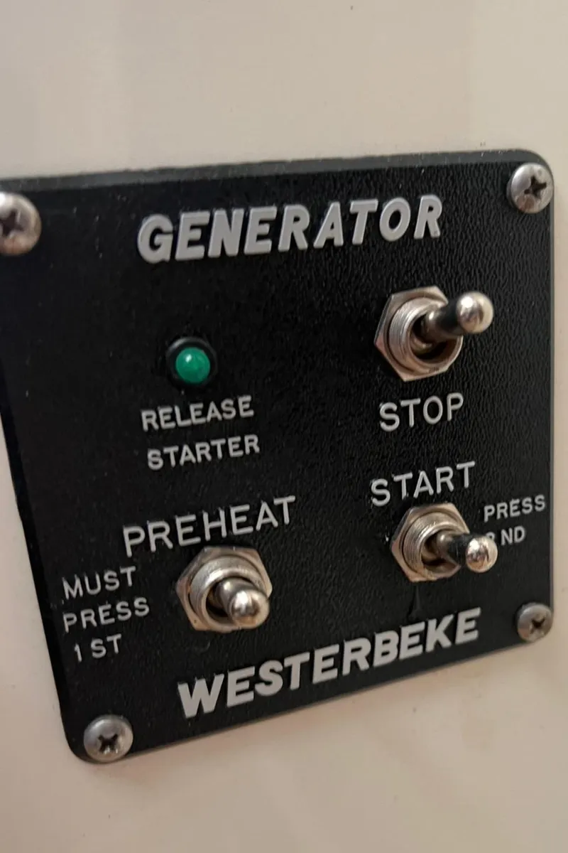 Slide: The Image of 2005 Albemarle 310 Express Fisherman cabin interior with audio control panel. - 18