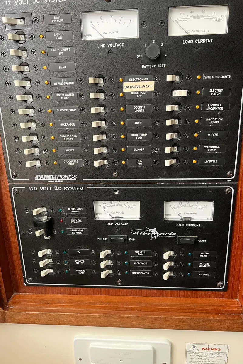 Slide: The Image of Electrical control panel of a 2005 Albemarle 310 Express Fisherman boat. - 21