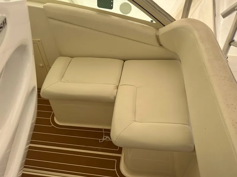 Slide: The Image of 2005 Albemarle 310 Express Fisherman boat deck with teak flooring. - 8