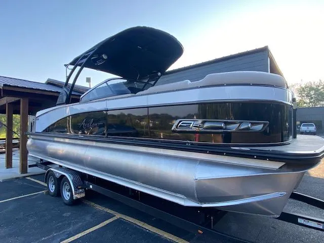 Slide: The Image of 2024 Avalon Catalina 2585 VRB pontoon boat on a trailer. - 1