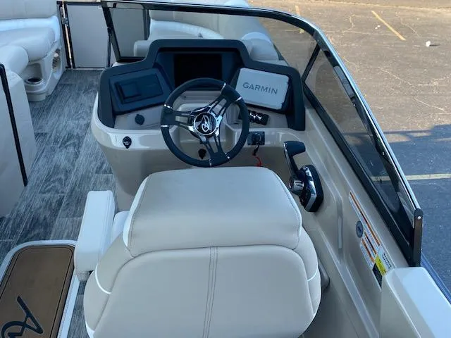 Slide: The Image of 2024 Avalon Catalina 2585 VRB boat cockpit with Garmin navigation system. - 13