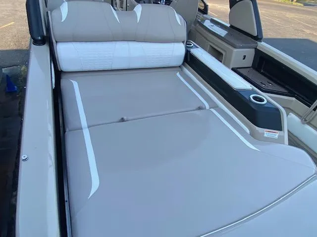 Slide: The Image of 2024 Avalon Catalina 2585 VRB boat interior with beige and white seating. - 24