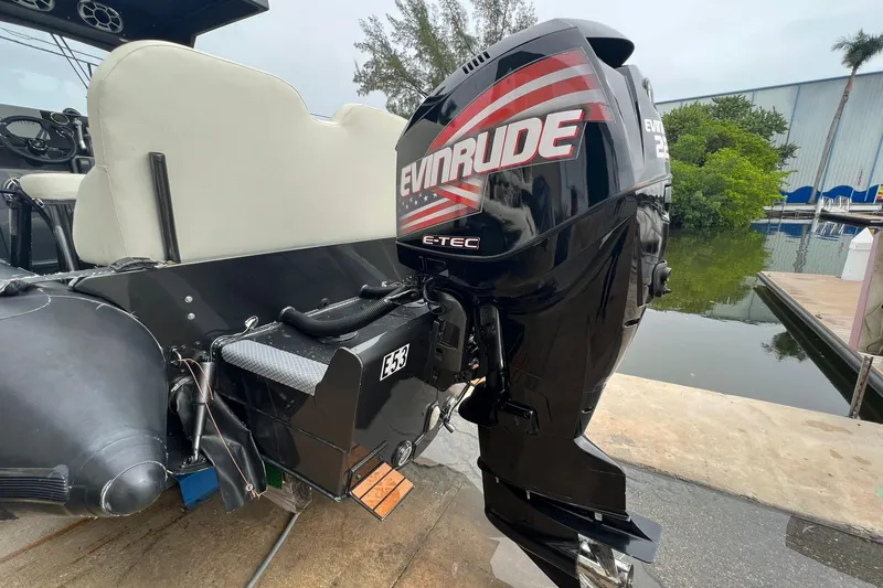 Slide: The Image of Zodiac Milpro Hurricane Custom 2014 boat with Evinrude E-TEC outboard motor. - 1