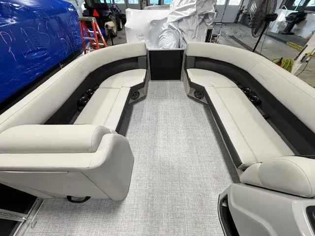 Slide: The Image of 2024 Harris Cruiser 230 CWDH interior with spacious seating and modern design. - 19