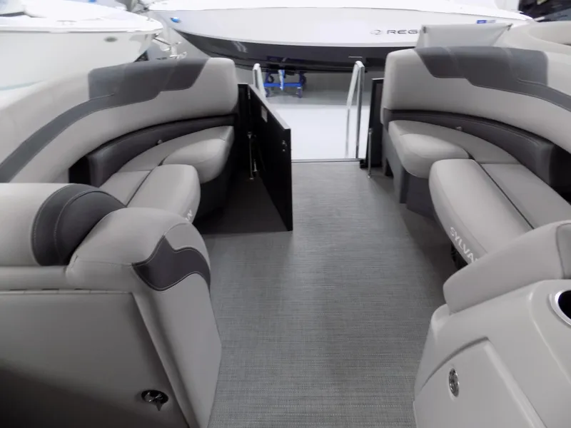 Slide: The Image of 2024 Sylvan L3 DLZ boat interior with gray seating and modern design. - 4
