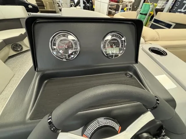 Slide: The Image of Dashboard of 2024 Harris CRUISER 190 CW boat with gauges and steering wheel. - 16